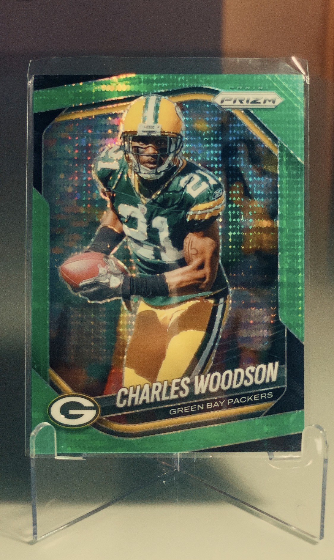 Charles Woodson — Panini Prizm Green Pulsar